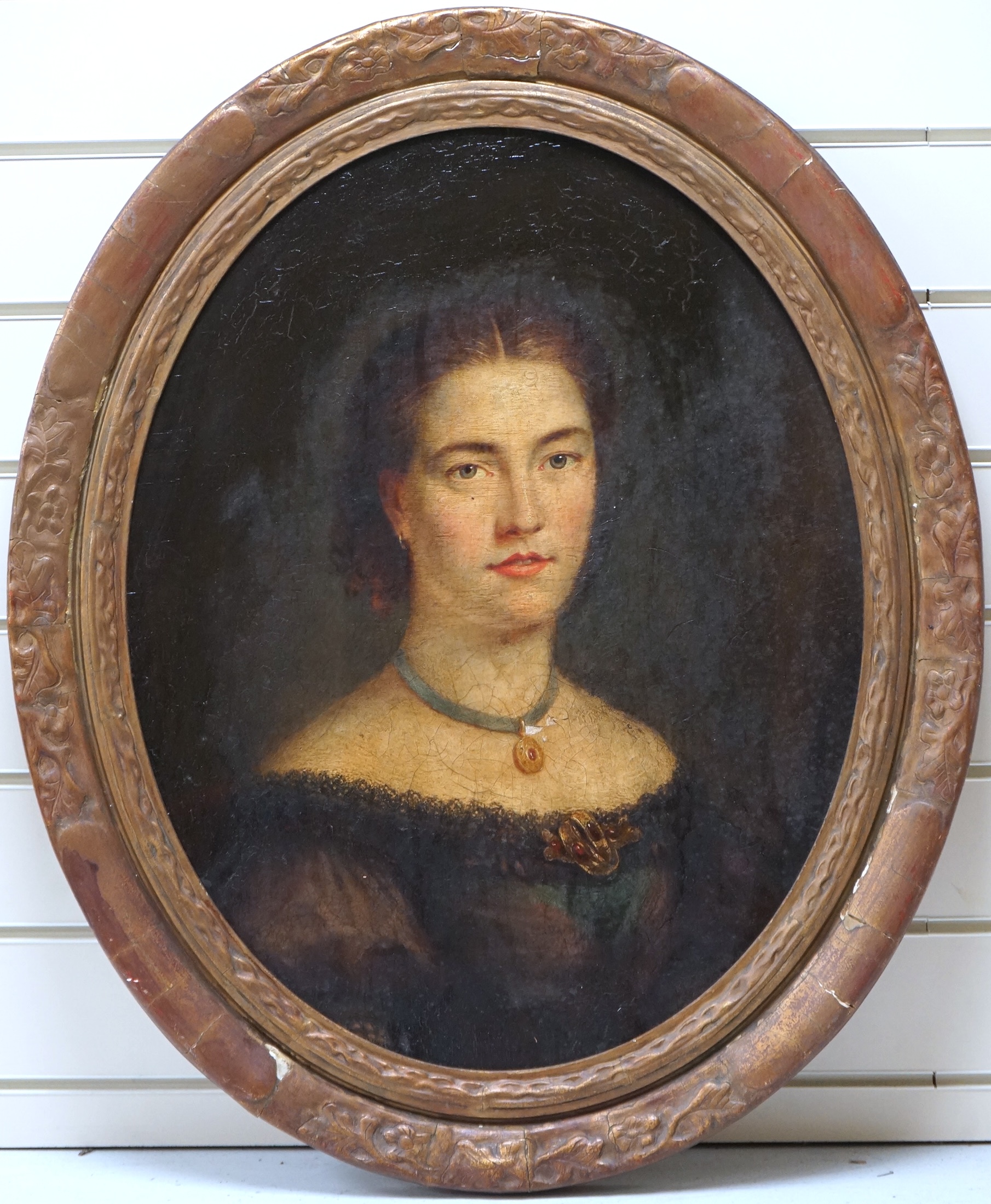 Late Victorian School, oval oil on board, Head and shoulders portrait of a young lady, unsigned, 58 x 45cm